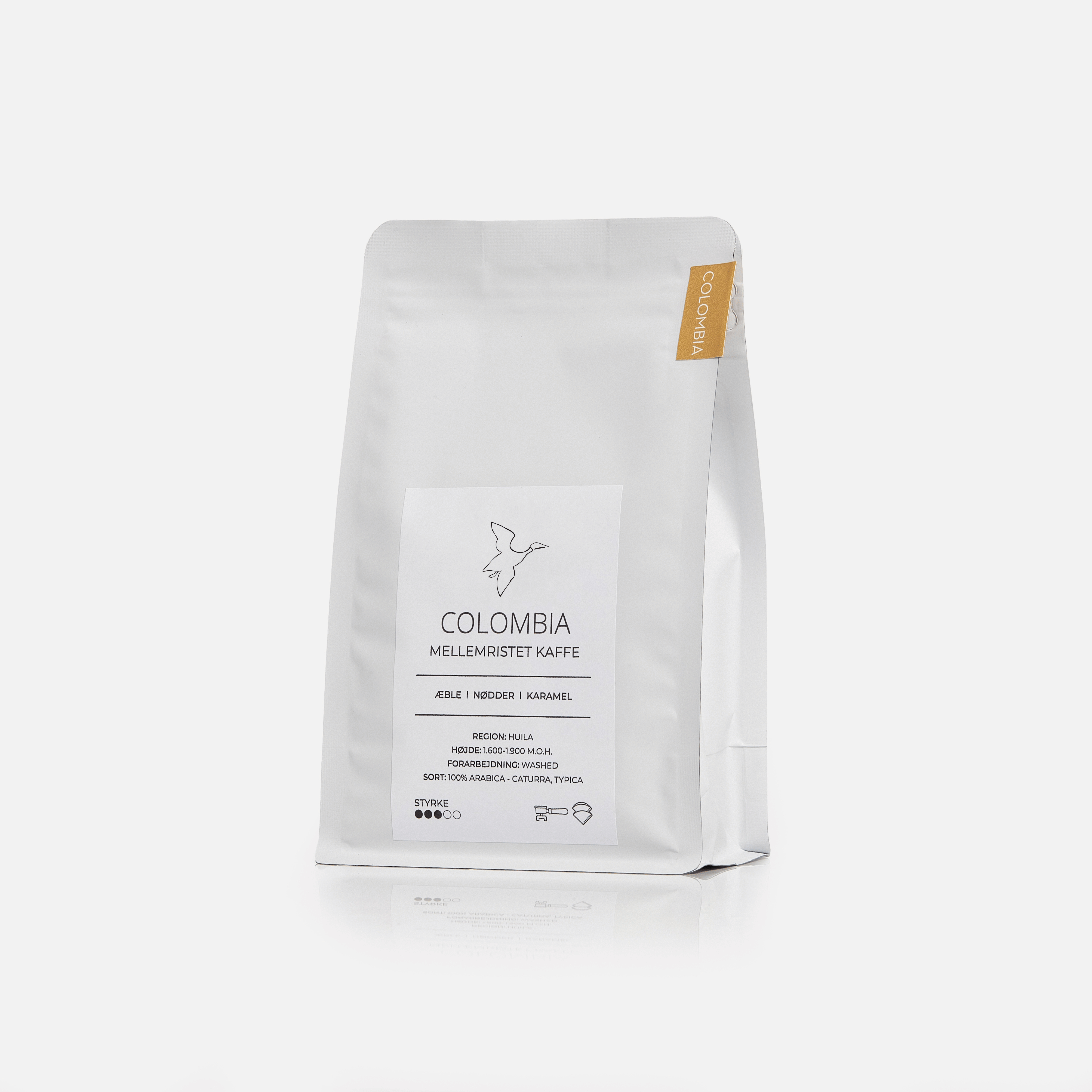 Friskristet colombiansk kaffe fra Huila 250g i hvid kaffepose fra GITZ COFFEE med noter af æble, nødder og karamel