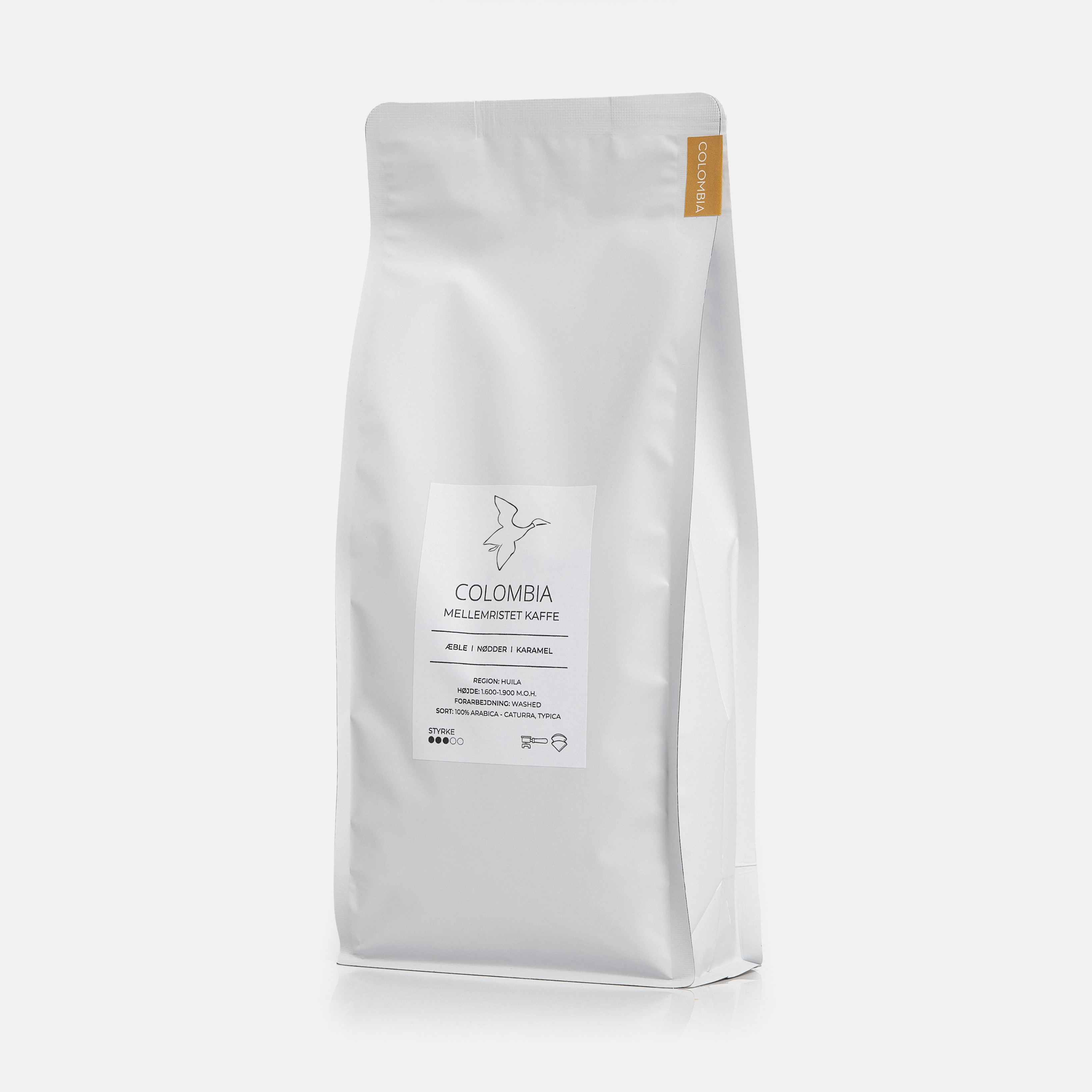 Friskristet colombiansk kaffe fra Huila 1000g i hvid kaffepose fra GITZ COFFEE med noter af æble, nødder og karamel